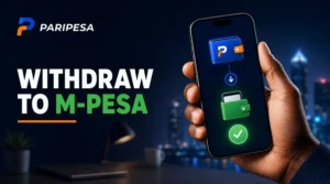 Smartphone showing an M-Pesa payment confirmation screen at night, warm orange glow, East African setting